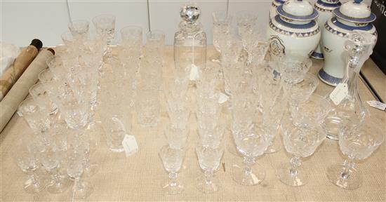 An Edinburgh crystal sixty three piece suite of drinking glasses and a matching decanter and stopper, 20th century